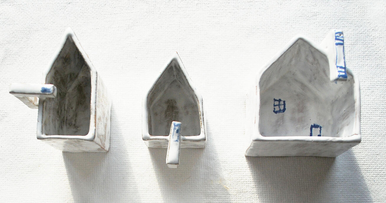 ARCHITECTS CUPS -ceramic cups are an exploration of the typical shape of a house and its components, transformed into cups for small amounts of tea, coffee, or for planting flowers.